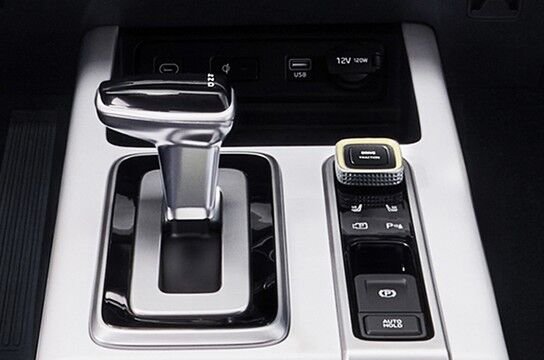 Тұтқадағы ағымдағы берілістің визуалды көрсеткіші бар беріліс режимін ауыстыру тұтқасы.